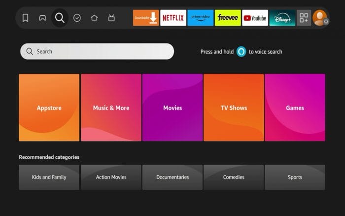 From the home-screen of your Firestick, hover over the search tab and click on the search bar.