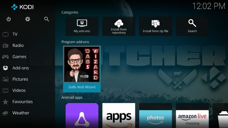 Return back to the home screen of Kodi, hover over Add-ons and click DaBs Kodi Wizard under Program add-ons.