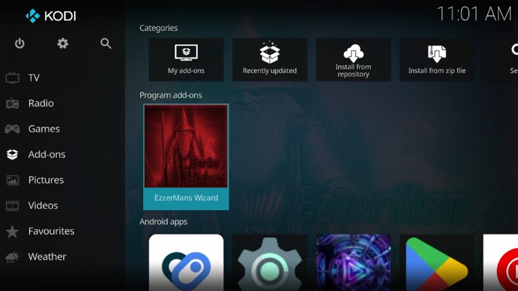 Return back to the home screen of Kodi, hover over Add-ons and click the EzzerMans Wizard under Program add-ons.